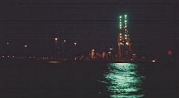 The docks at night, seen from a boat on the Yarra River, Melbourne, Australia