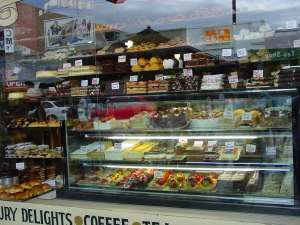 Reflections of Acland Stree in a cake display case, St Kilda, Melbourne, photograph (c) Ali Kayn 2005